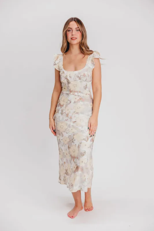 Pisa Floral Chiffon Midi Dress with Ruffle Shoulder in Champagne sold by Worth Collective