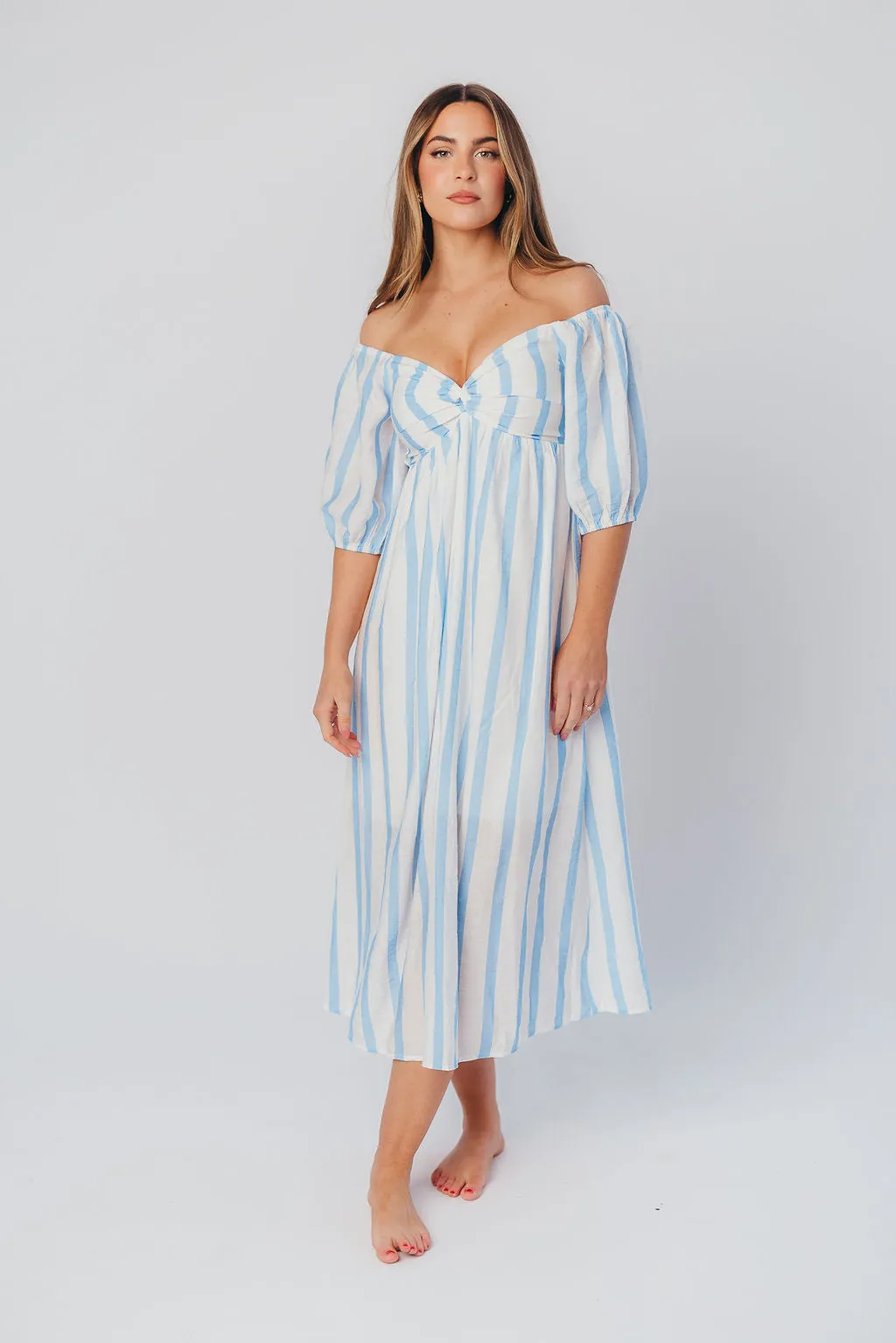 Clara Puffed Sleeve Midi Dress with Twisted Bodice in Cloud sold by Worth Collective