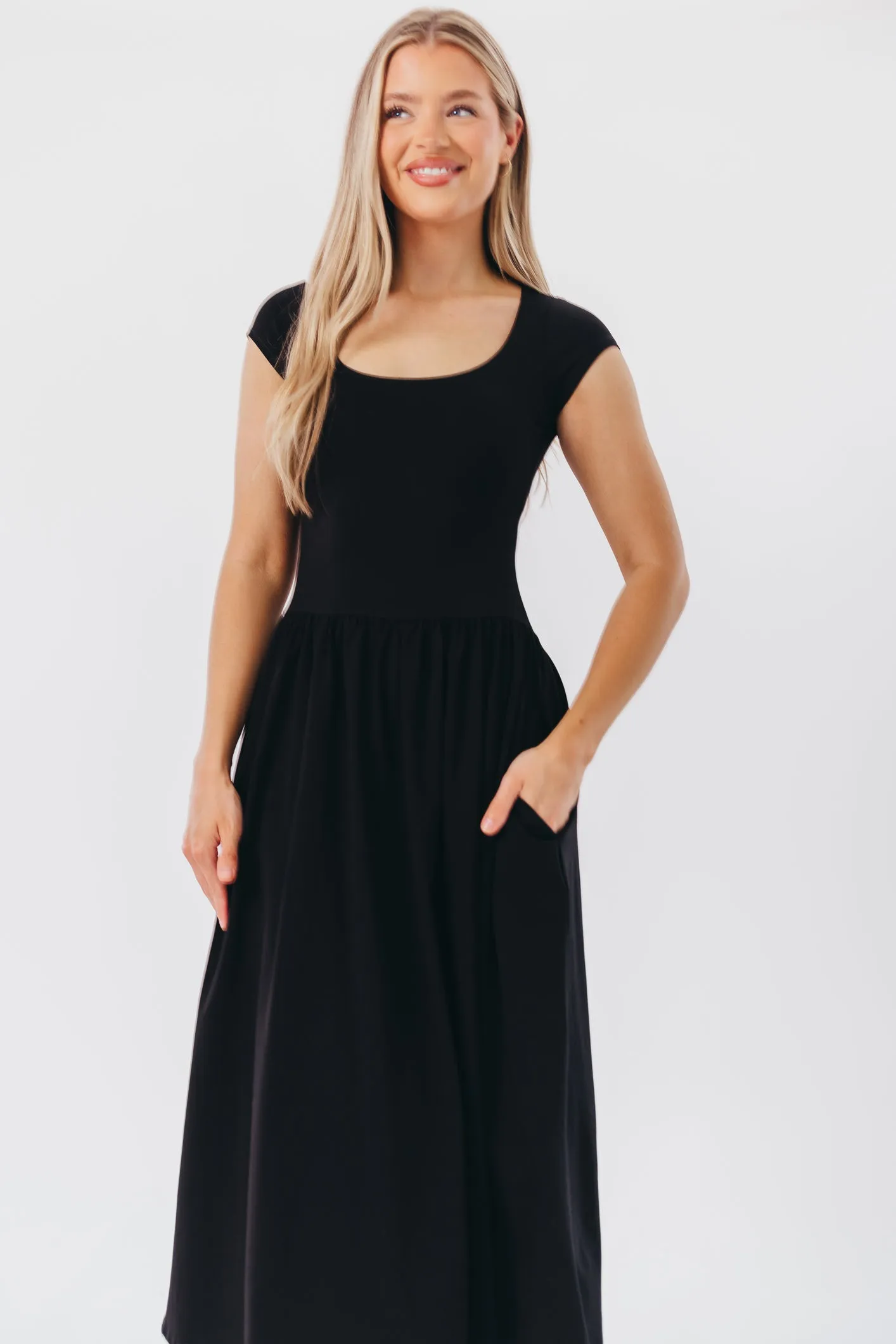 Larissa Cap Sleeve Midi Dress in Black sold by Worth Collective product image thumbnail 4