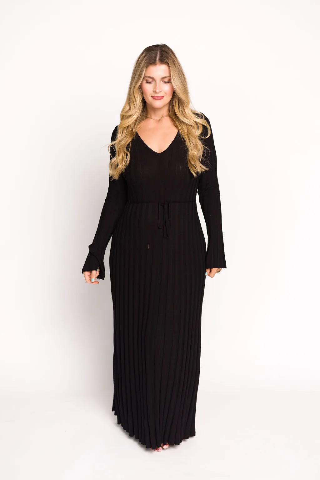 Hadley Long Sleeve V-Neck Knit Maxi Dress in Black sold by Worth Collective