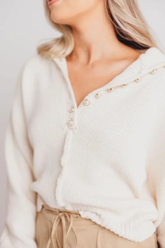 Maggie Mock-Neck Sweater with Pearl Button Detail in Almond sold by Worth Collective