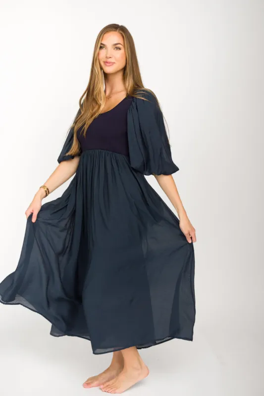 Raina Combination Midi Dress with Puff Sleeves in Navy - Bump Friendly sold by Worth Collective