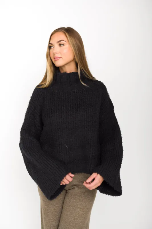 Lexia Pullover Sweater in Black sold by Worth Collective