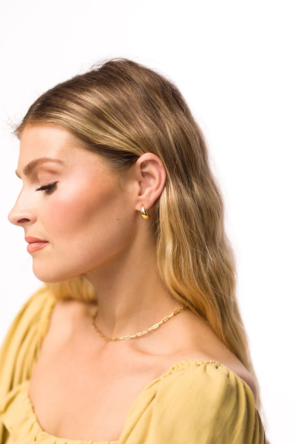 Crescent Dome Earrings in Gold sold by Worth Collective