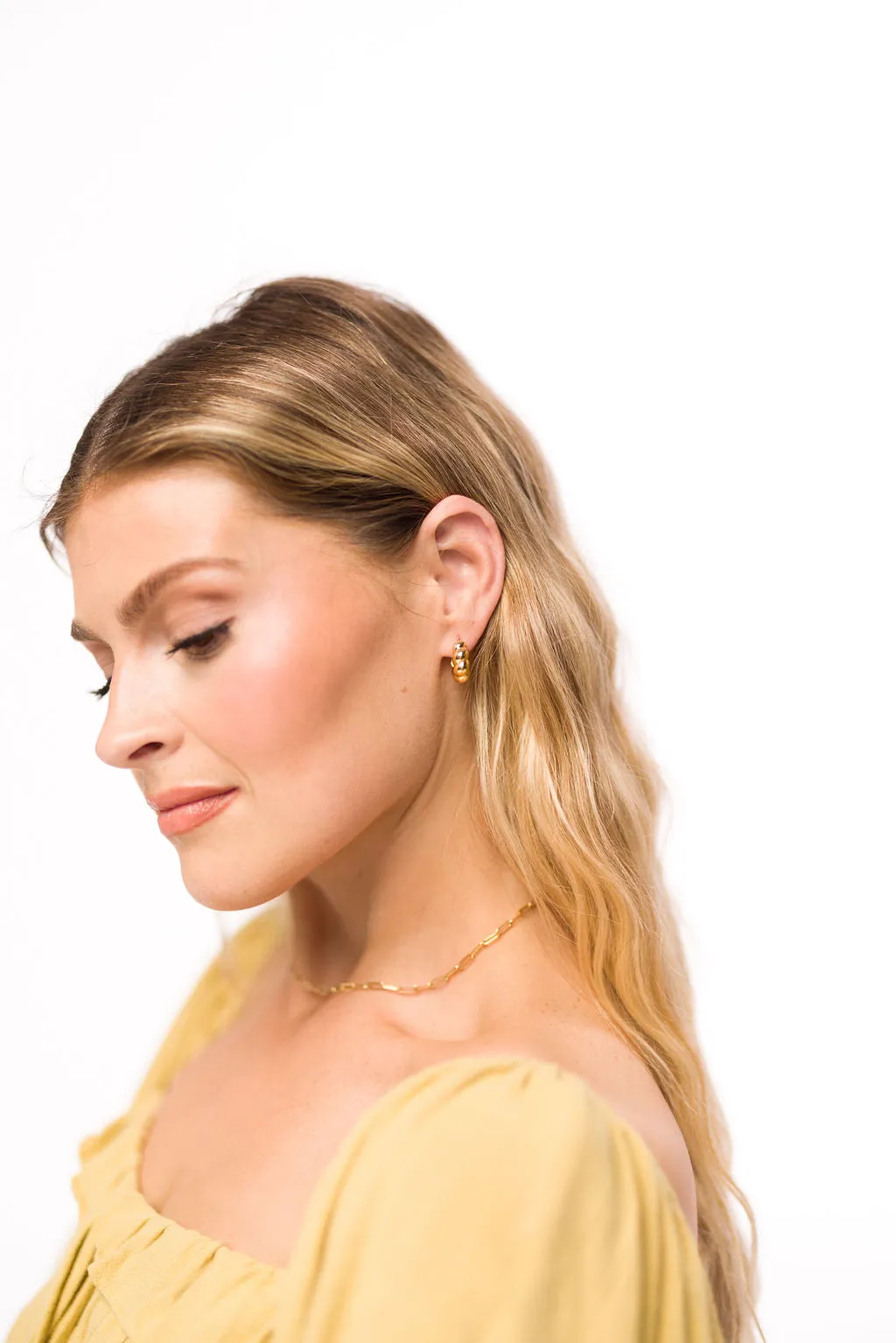 Croissant Huggie Hoop in Gold sold by Worth Collective product image thumbnail 2