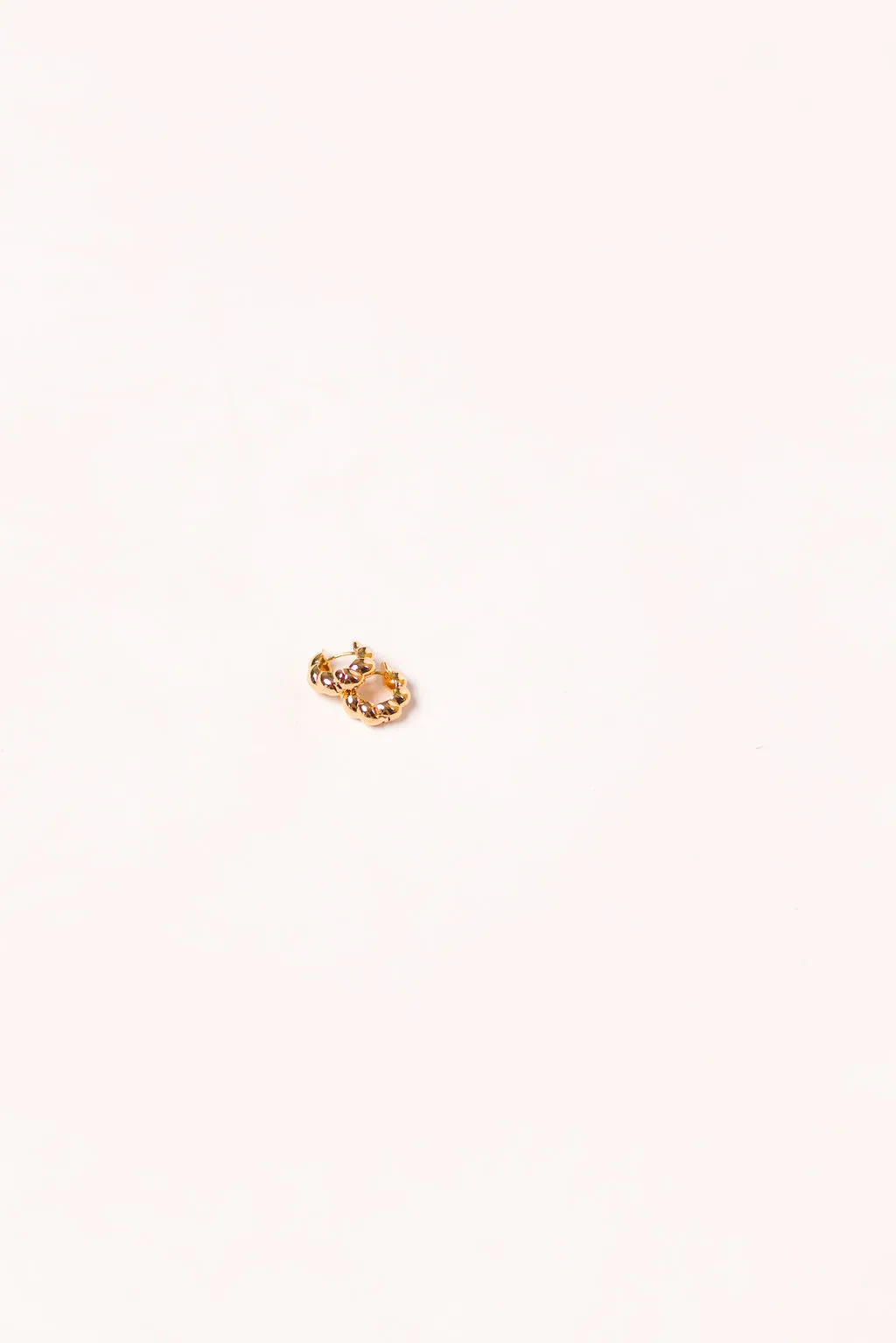 Croissant Huggie Hoop in Gold sold by Worth Collective product image thumbnail 3