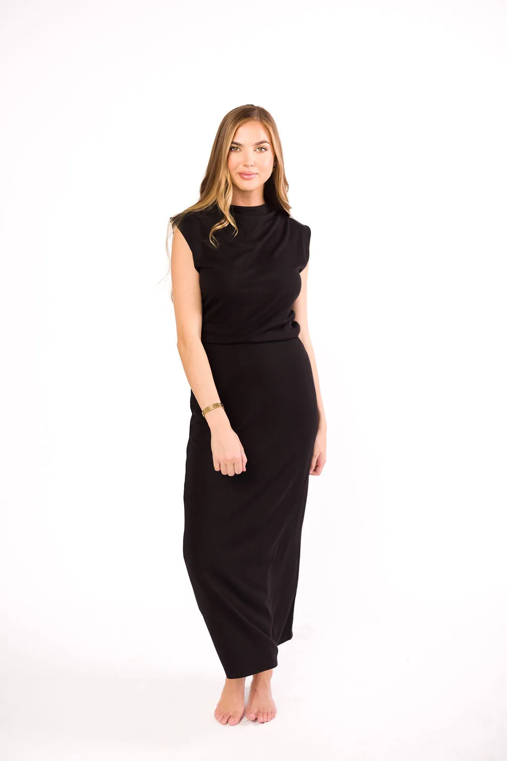 The London Knit Top and Skirt Set in Black sold by Worth Collective