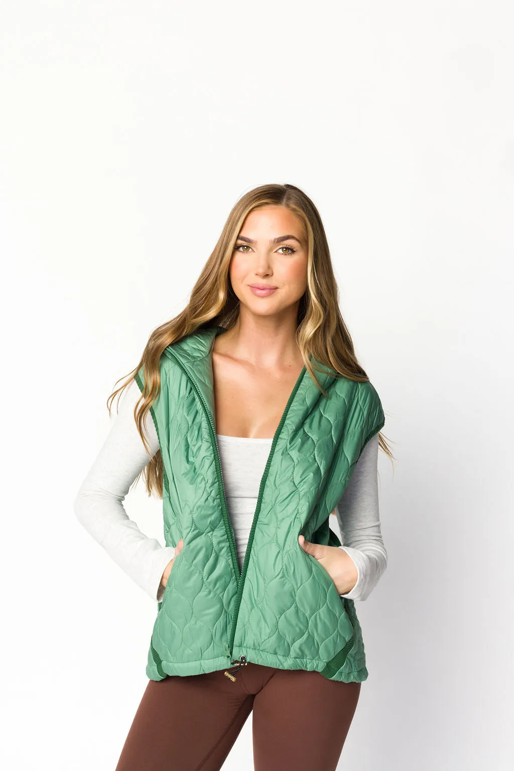 Selma Hooded Quilted Zipper Puffer Vest in Olive sold by Worth Collective