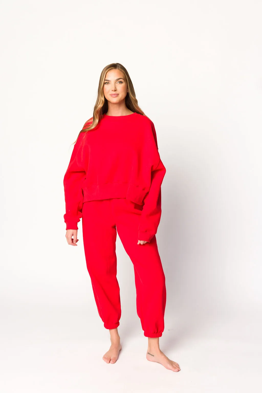 Comfy Cozy Sweatshirt and Sweatpants Set in Red sold by Worth Collective