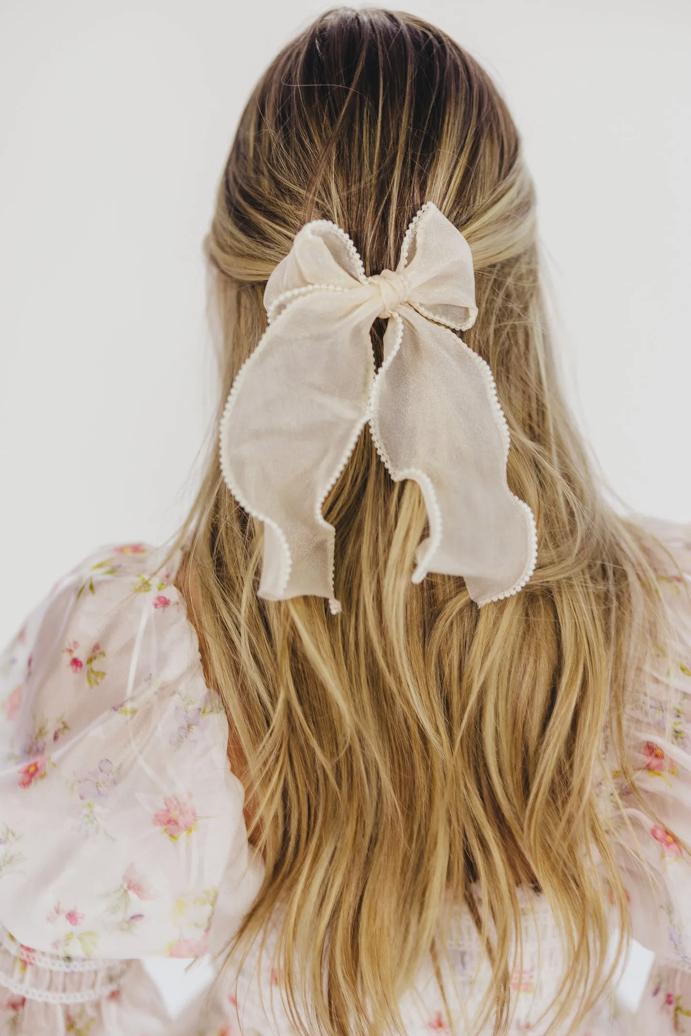 Pearl Long Bow Clip in Cream sold by Worth Collective product image thumbnail 4