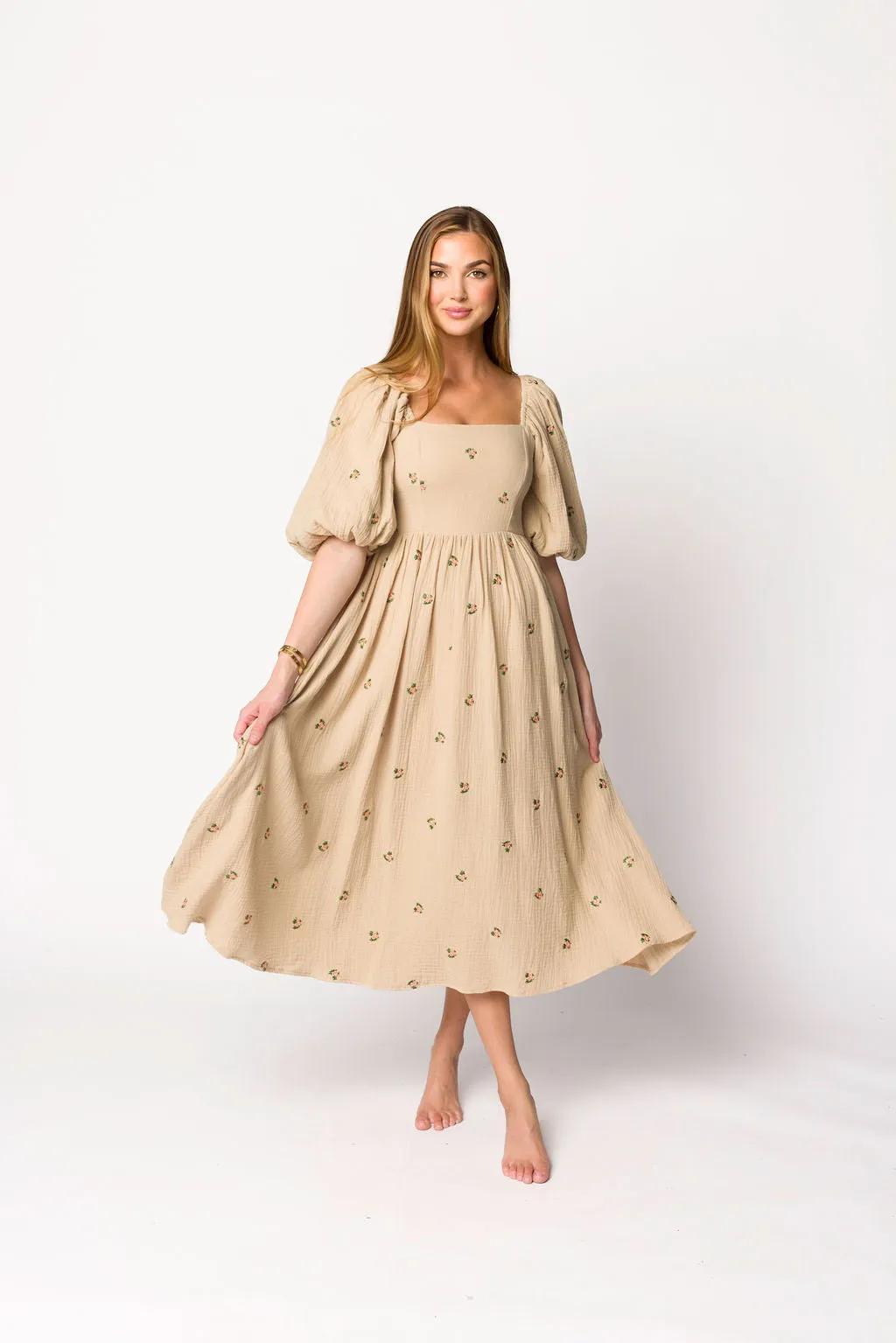 Natalie Embroidered Floral Midi Dress in Taupe sold by Worth Collective