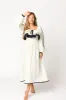 Megan Ruffle Long Sleeve Midi Dress in Cream/Navy sold by Worth Collective