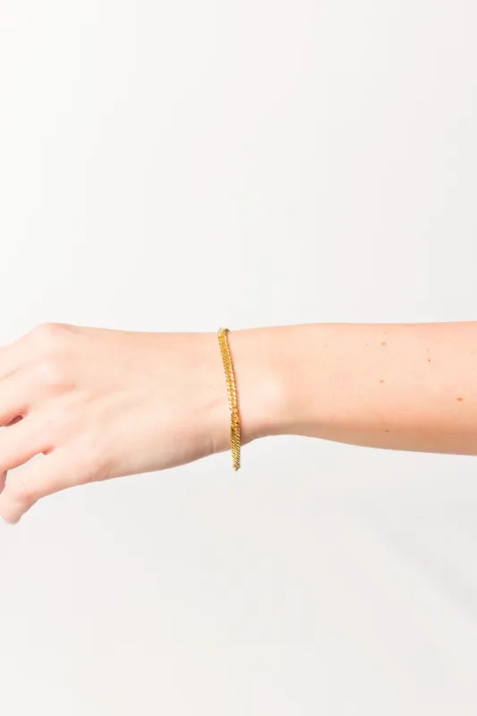 The Jenny Bracelet in Gold sold by Worth Collective