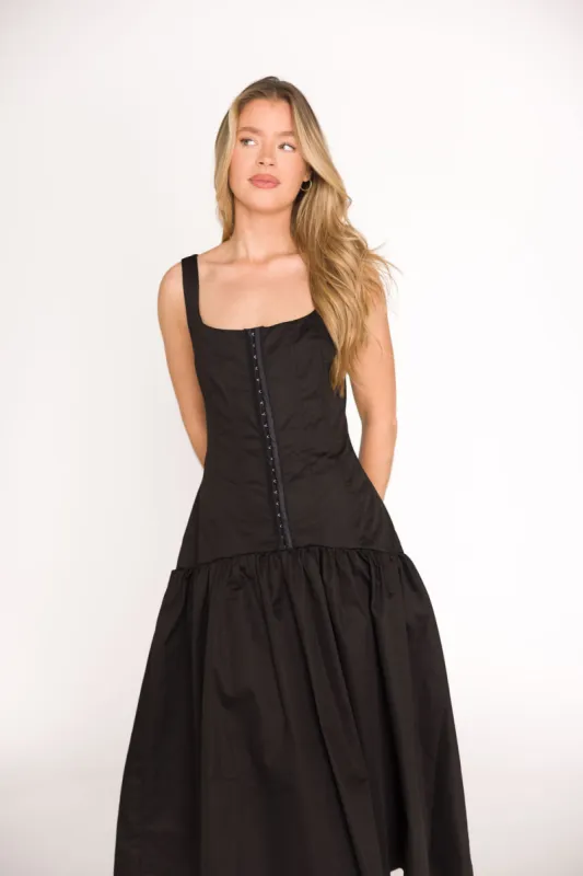 Violet Corset Style Drop Waist Midi Dress in Black sold by Worth Collective