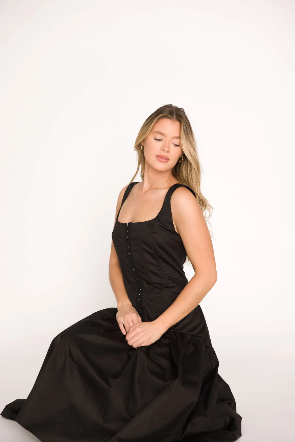 Violet Corset Style Drop Waist Midi Dress in Black sold by Worth Collective product image thumbnail 5