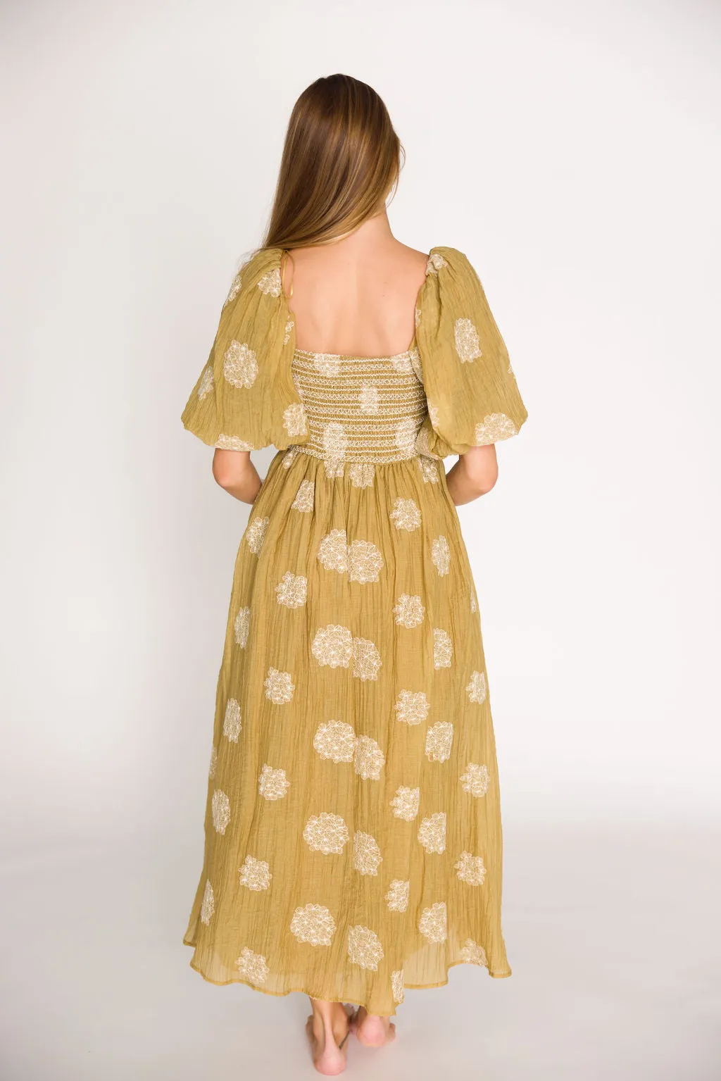 Aimee Smocked Embroidered Floral Midi Dress in Olive sold by Worth Collective product image thumbnail 4