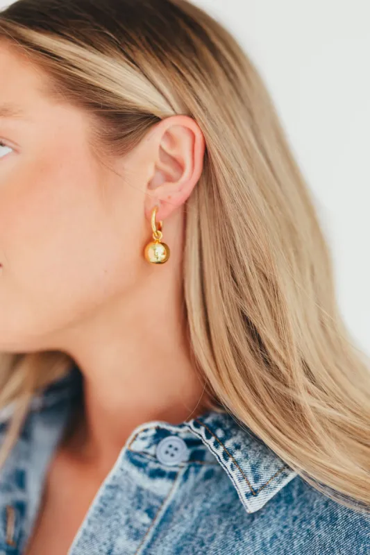 The Greta Hoops in Gold sold by Worth Collective