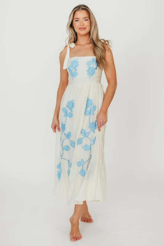 Clementine Embroidered Midi Dress in Cream/Light Blue sold by Worth Collective