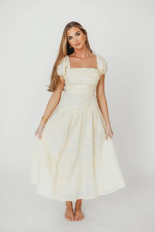 Gracie Embellished Midi Dress in Butter sold by Worth Collective