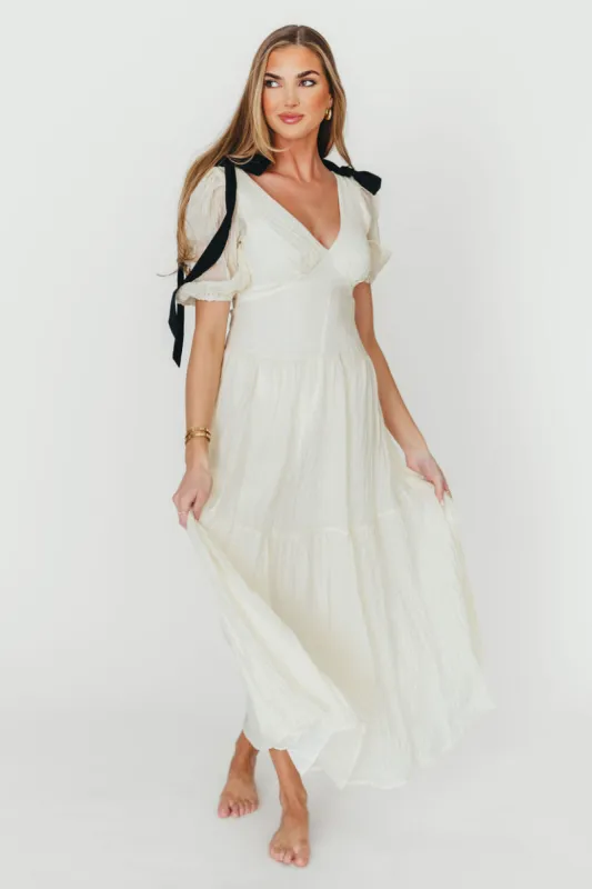Iris Puffy Sleeve with Bows Maxi Dress in Cream sold by Worth Collective