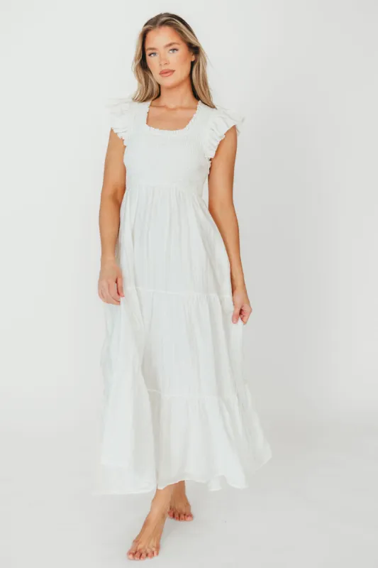 Lennon Smocked Flutter Sleeve Tiered Maxi Dress in Off-White made by Worth Collective