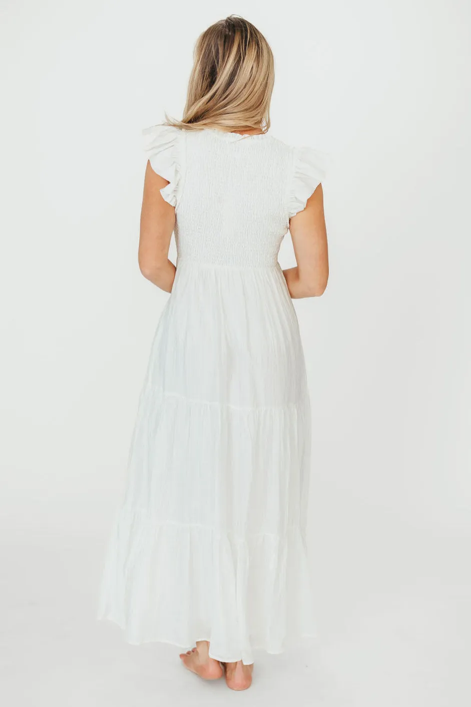 Lennon Smocked Flutter Sleeve Tiered Maxi Dress in Off-White sold by Worth Collective product image thumbnail 3