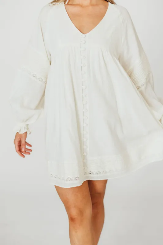 Kenzie Linen Pintuck and Button Detail Mini Dress in Off-White sold by Worth Collective
