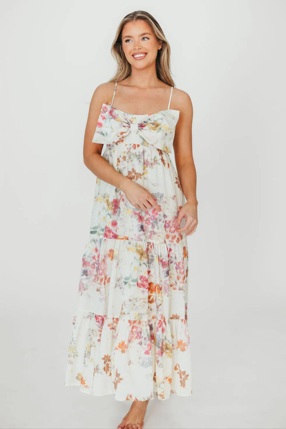 Cecile Bow Front Maxi Dress in Cream/Multi Floral sold by Worth Collective