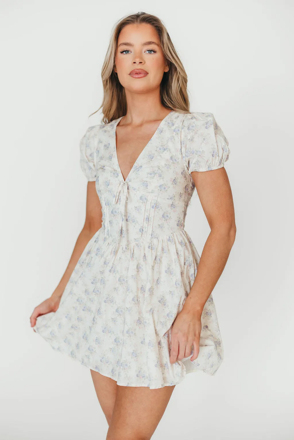 Veronica Mini Dress in Cream/Lilac Floral sold by Worth Collective