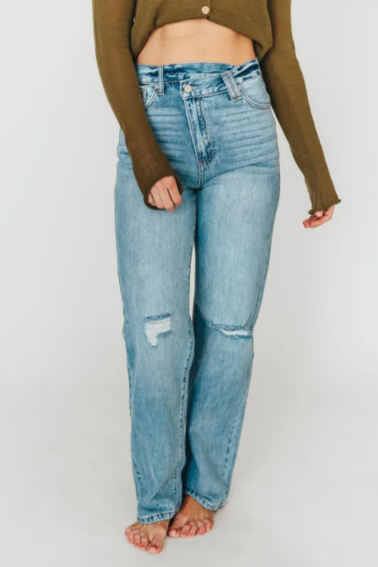 Tiffany 90s High-Rise Crisscross Waist Straight Jeans in Light Wash sold by Worth Collective