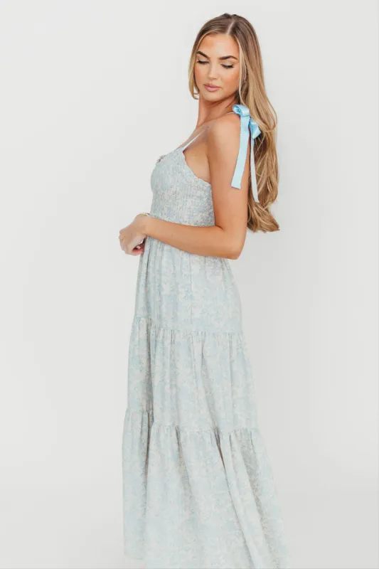 Lottie Tiered Maxi Dress in Blue Floral sold by Worth Collective