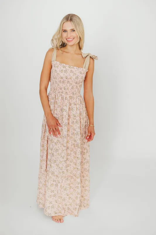 Cora Smocked Bow Tie Strap Maxi Dress in Blush sold by Worth Collective