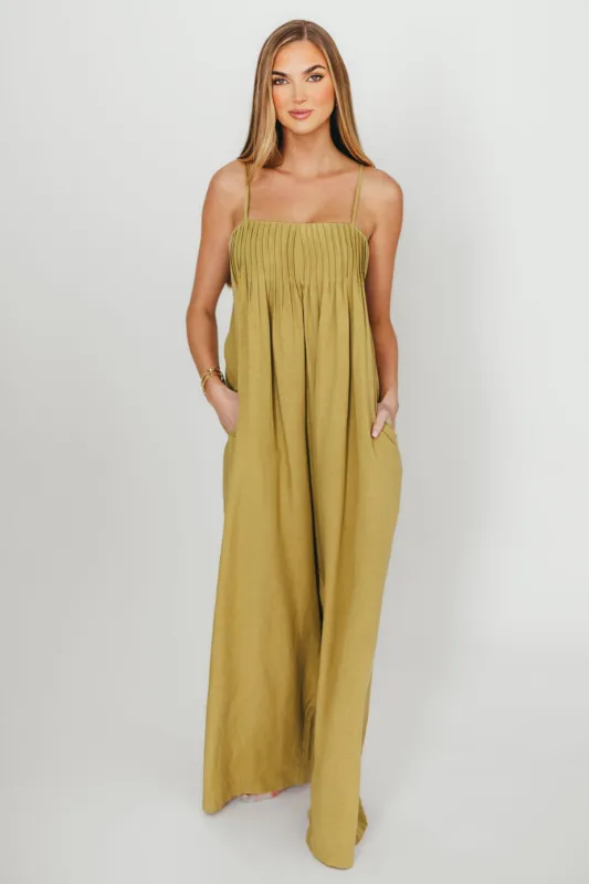 Adeline Pleated Jumpsuit in Olive sold by Worth Collective