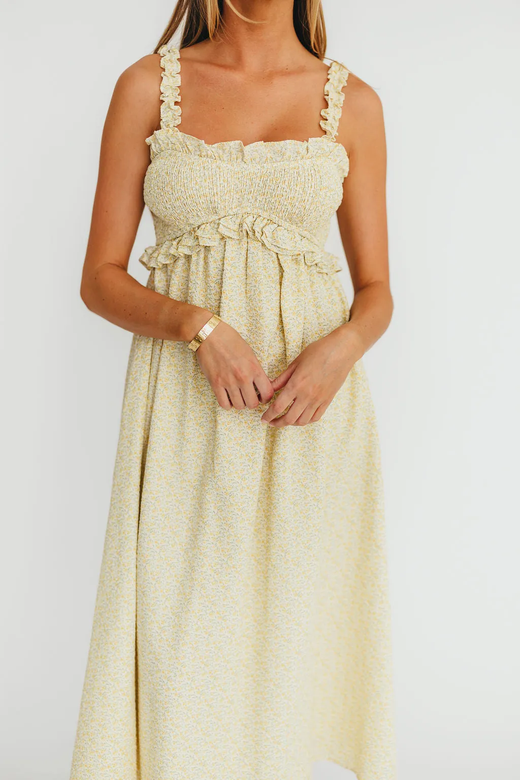 Raya Ruffle Trim Midi Dress in Yellow Floral sold by Worth Collective