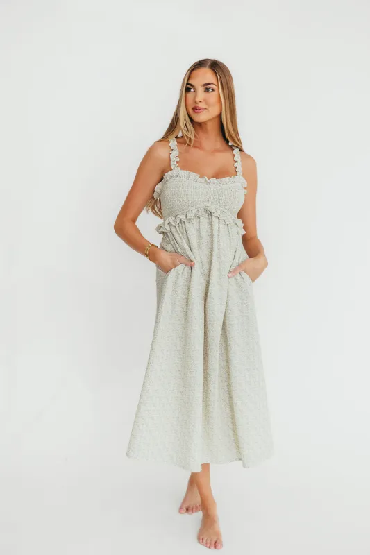 Raya Ruffle Trim Midi Dress in Blue Floral sold by Worth Collective