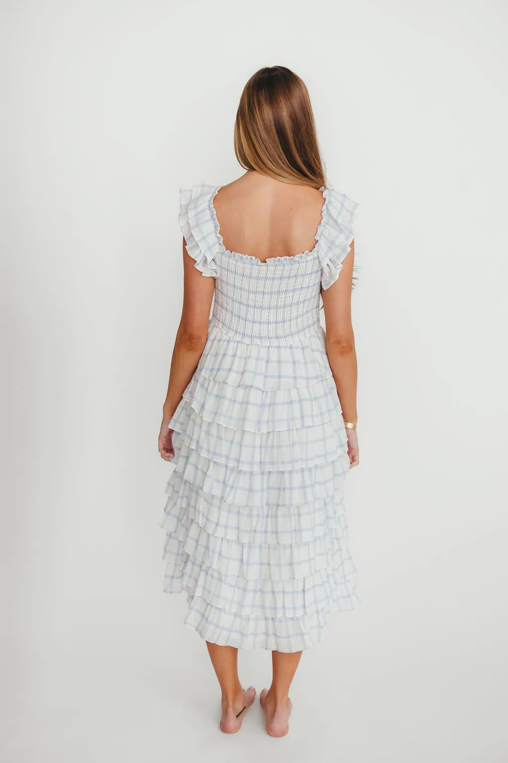 Adelynn Ruffle Midi Dress in White/Blue sold by Worth Collective product image thumbnail 4
