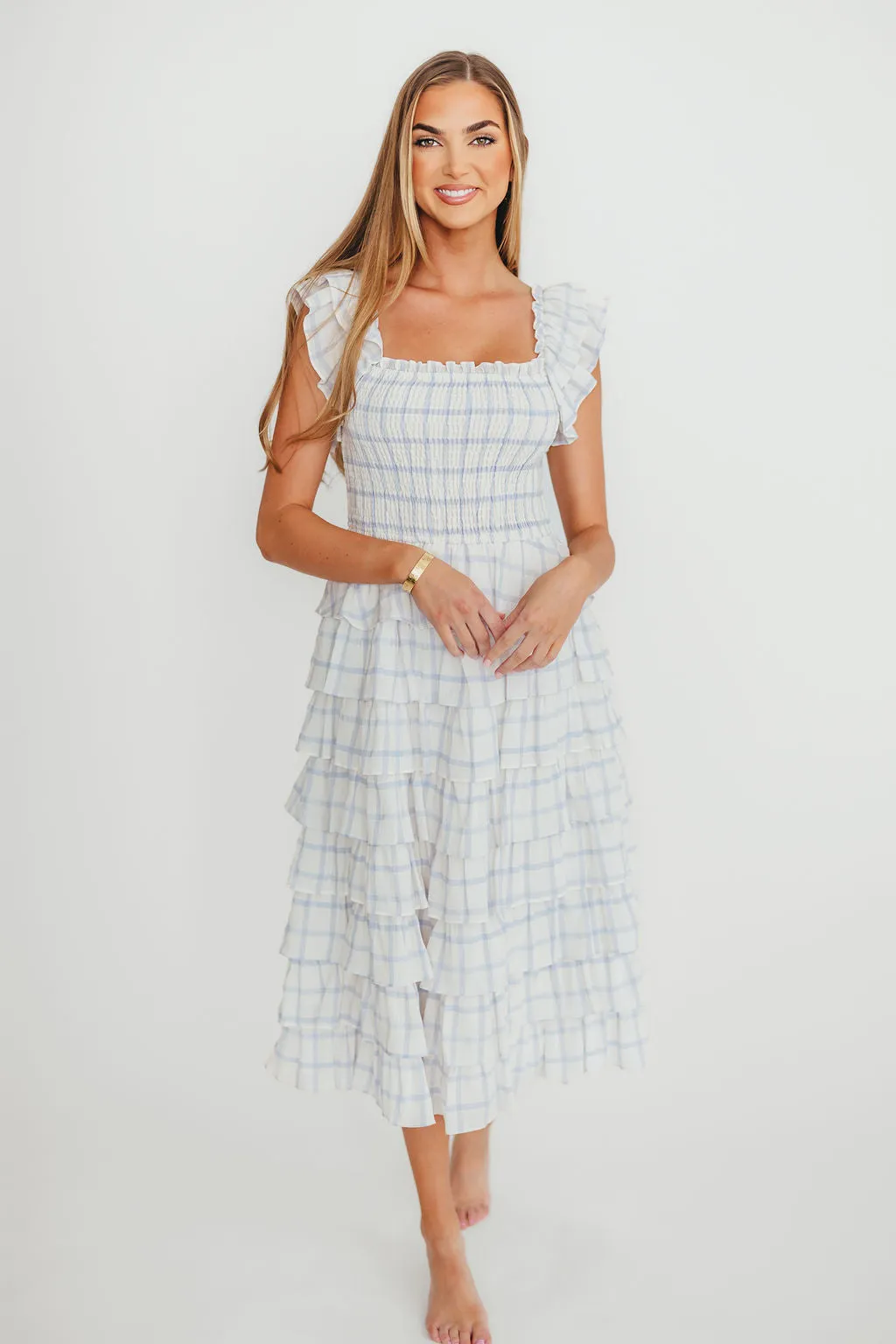Adelynn Ruffle Midi Dress in White/Blue sold by Worth Collective