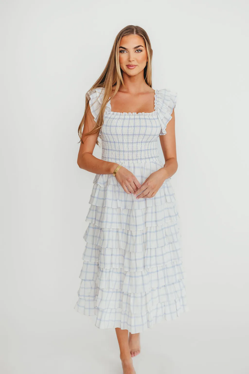 Adelynn Ruffle Midi Dress in White/Blue sold by Worth Collective product image thumbnail 5