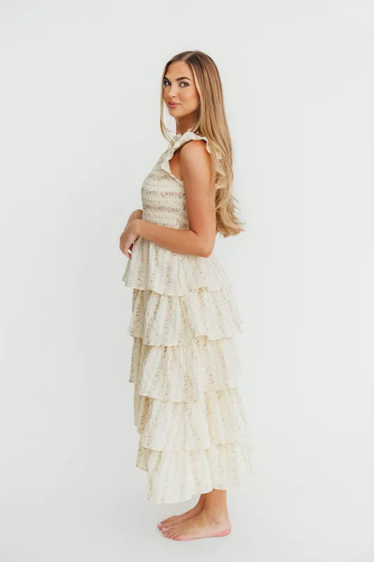 Emery Ruffled Midi Dress in Pink Floral sold by Worth Collective