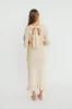 Mason Bow Tie Sweater Maxi Dress in Butter Cream sold by Worth Collective