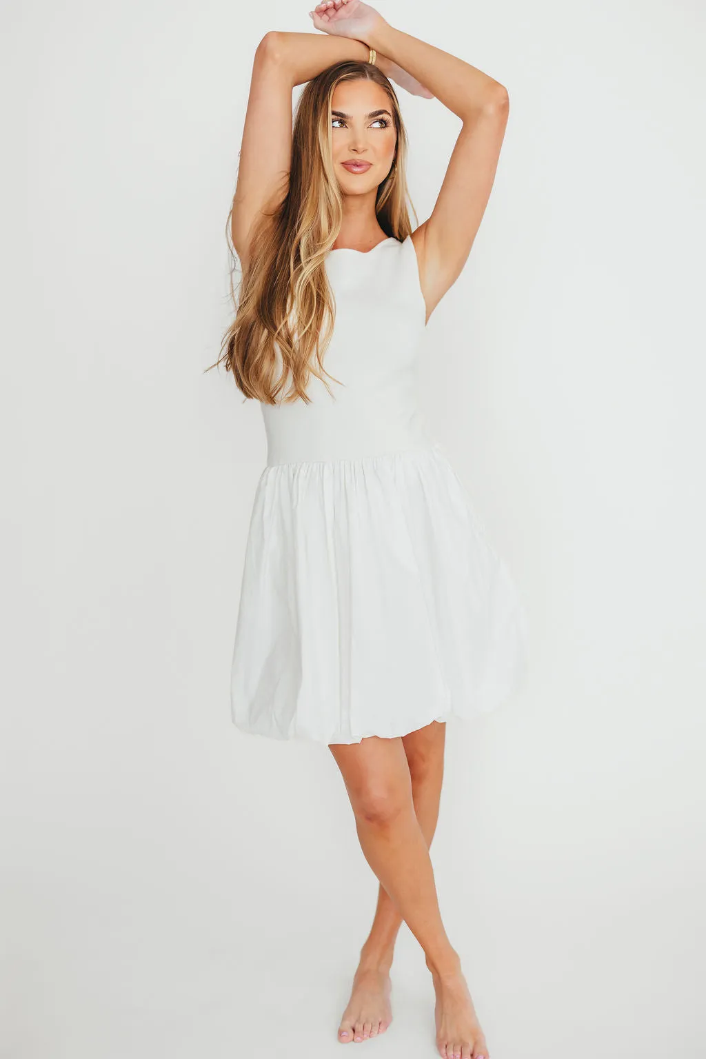 Audrey Bubble Mini Dress in White sold by Worth Collective product image thumbnail 3