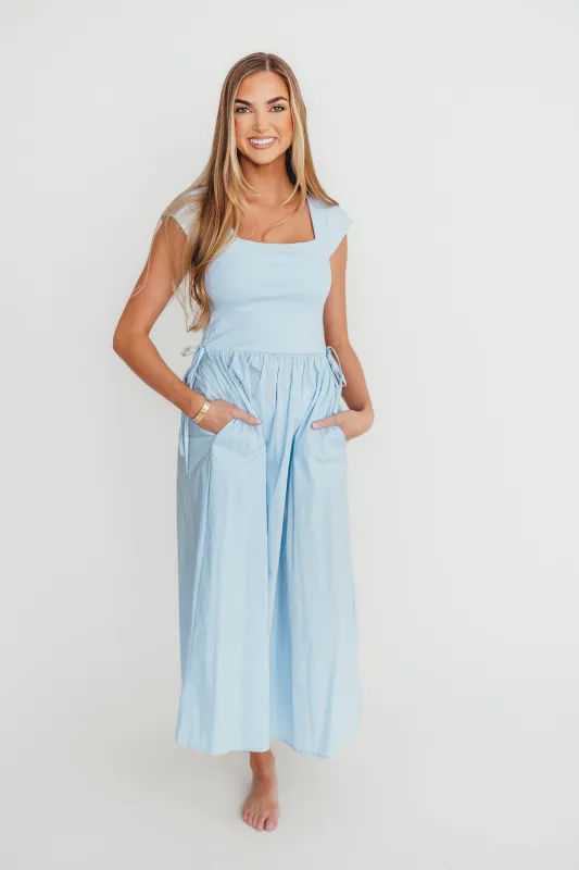 Delia Midi Dress in Blue sold by Worth Collective