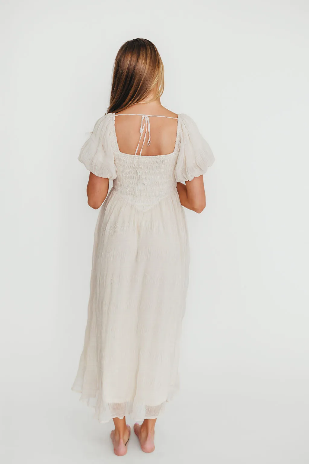 Laura Puff Sleeve Smocked Midi Dress in Ecru sold by Worth Collective product image thumbnail 4