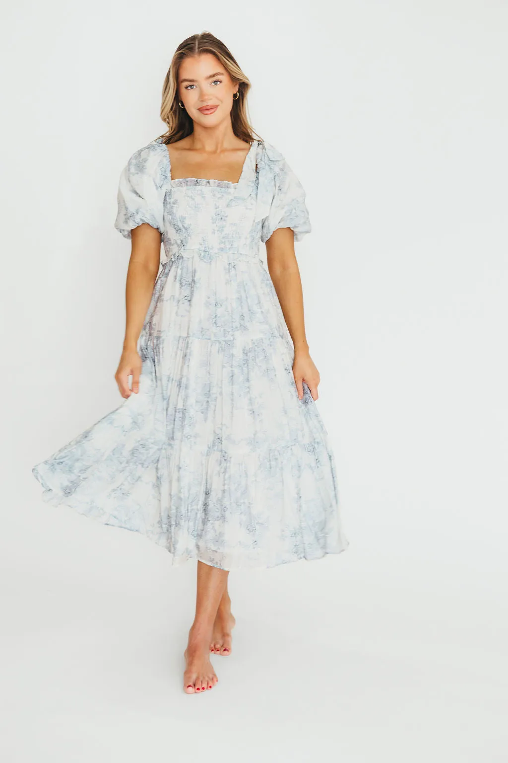 Elena Floral Print Smocked Midi Dress in Blue - Bump Friendly & Inclusive Sizing sold by Worth Collective product image thumbnail 2