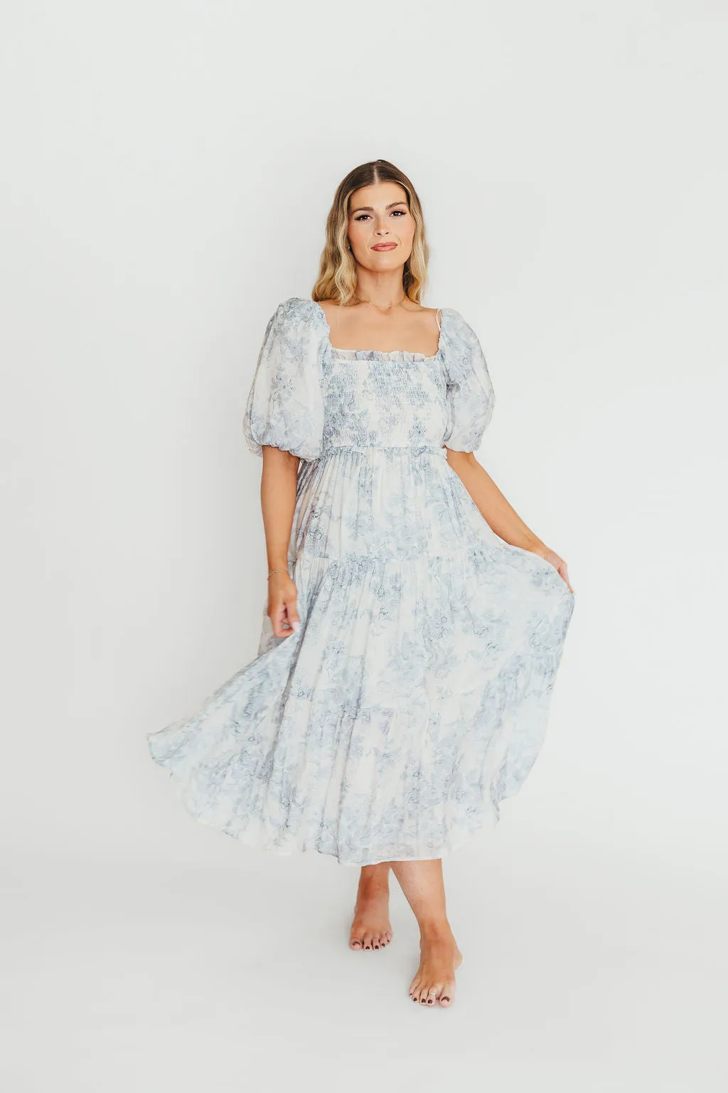 Elena Floral Print Smocked Midi Dress in Blue - Bump Friendly & Inclusive Sizing sold by Worth Collective product image thumbnail 5