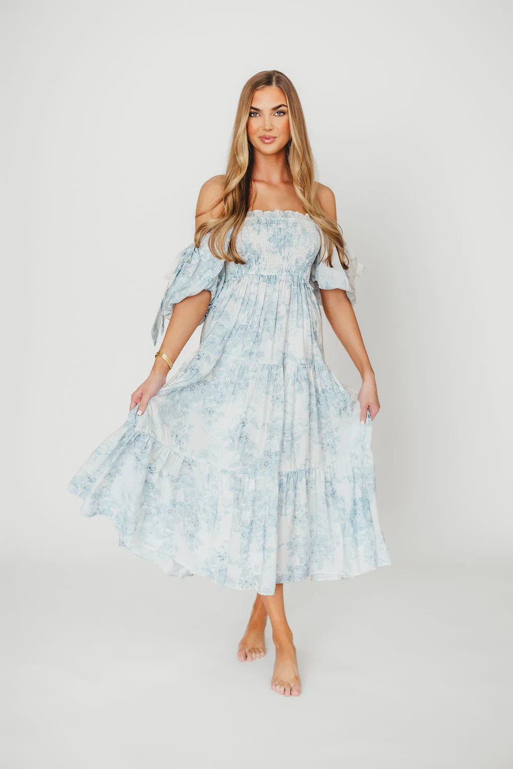 Elena Floral Print Smocked Midi Dress in Blue - Bump Friendly & Inclusive Sizing sold by Worth Collective product image thumbnail 3