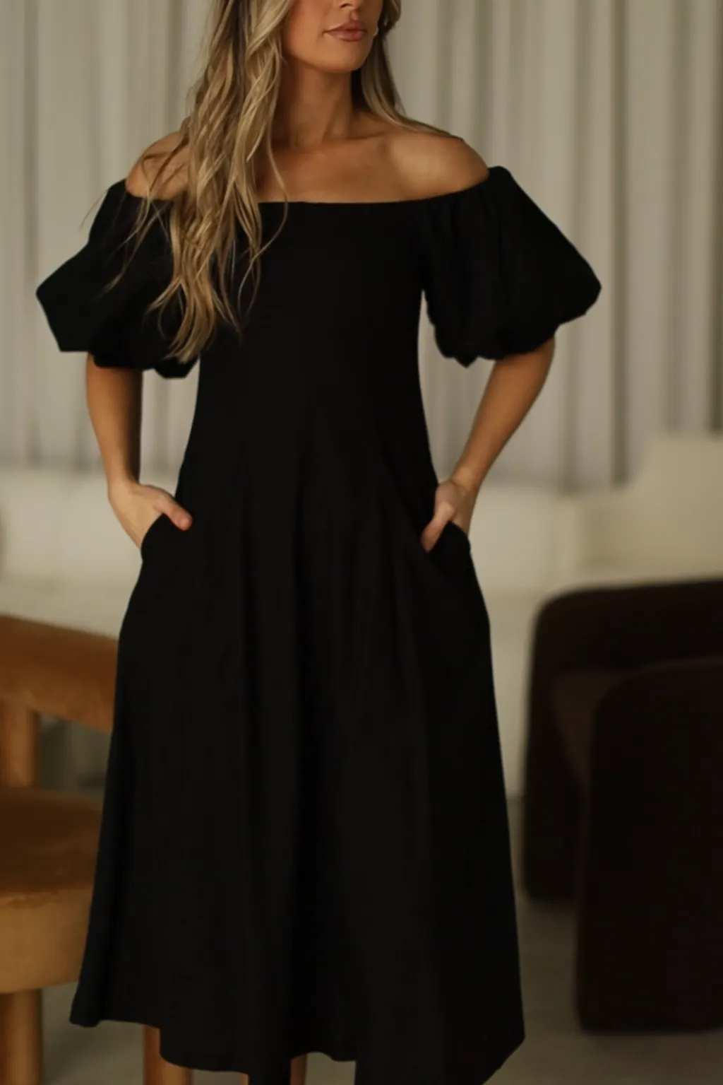 Serenity Off-The-Shoulder Midi Dress in Black sold by Worth Collective product image thumbnail 4