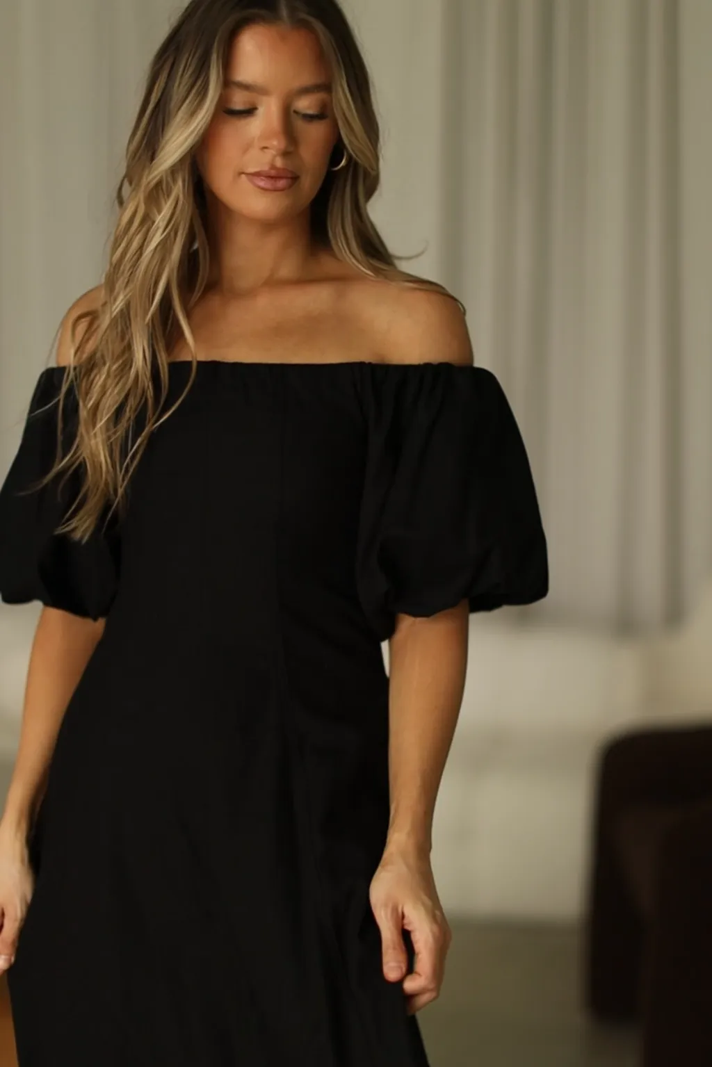 Serenity Off-The-Shoulder Midi Dress in Black sold by Worth Collective product image thumbnail 3