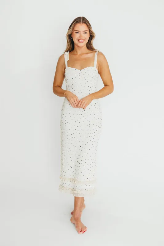 Maddie Tie Strap Ruffled Midi Dress in Ivory sold by Worth Collective
