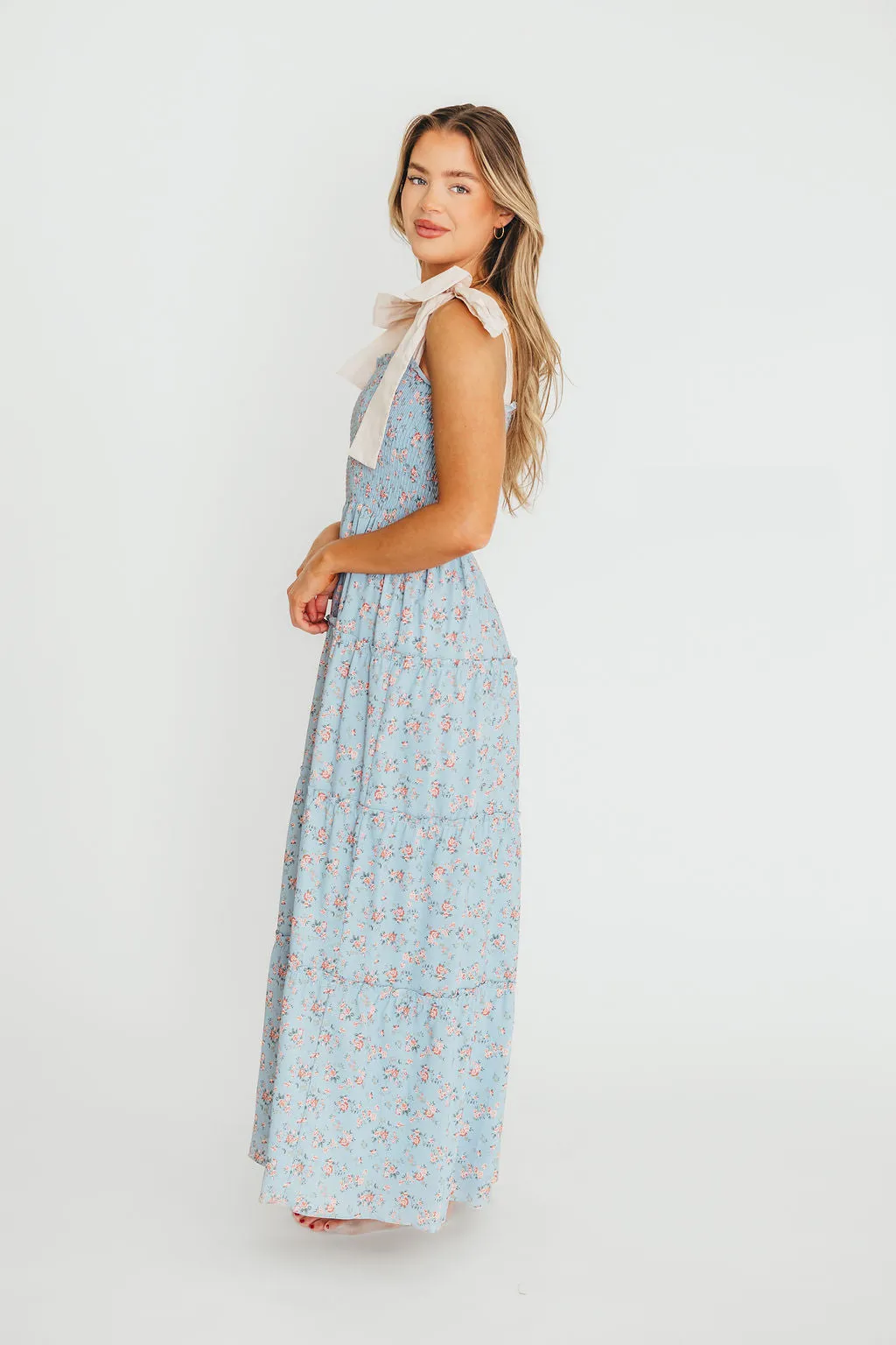 Cora Smocked Bow Tie Strap Maxi Dress in Blue sold by Worth Collective product image thumbnail 4